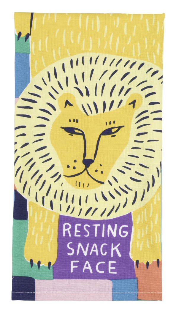 close up tea towel design - lion cartoon with the text "resting snack face"